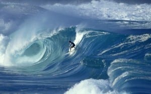 Surfer on a massive wave.