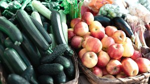 Closeup of baskets of fruits and vegetables.